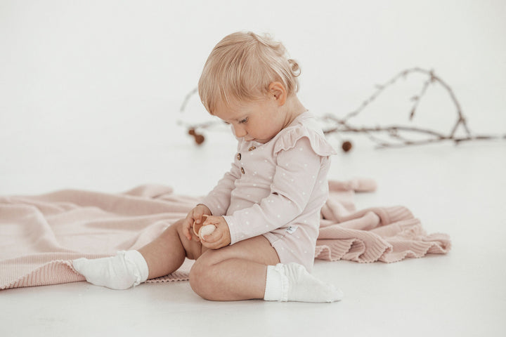 Cute newborn clothes. Organic cotton baby apparel mockup. Flat lay, top view
