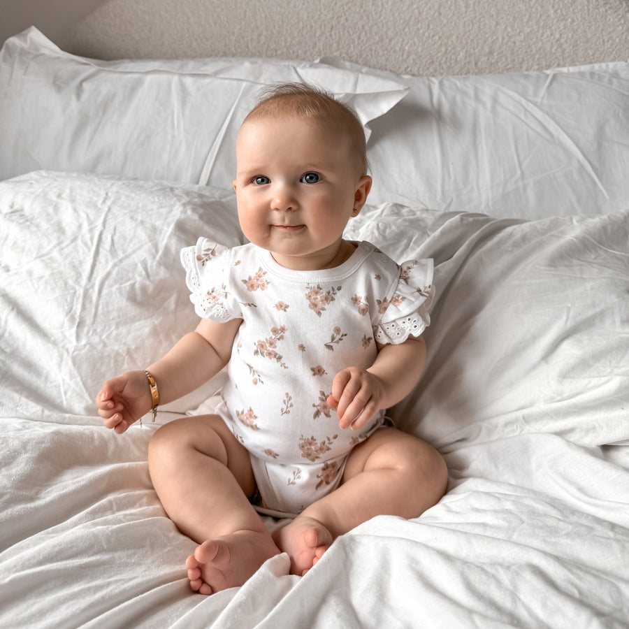 Blossom AOP Onesie