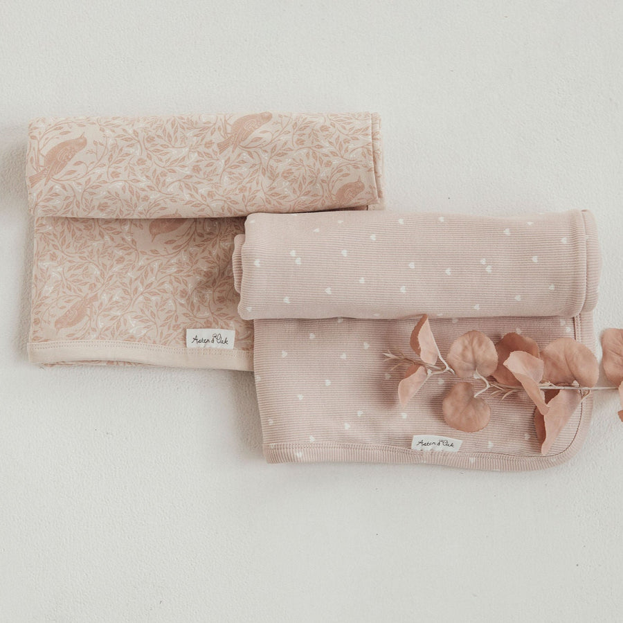 Aster & Oak Organic Baby Girls Swaddle Blanket Butterfly Pink Song Bird Baby Wrap Flatlay